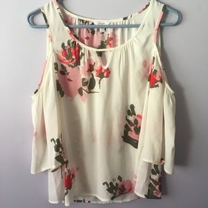 Cold shoulder top with flower print.